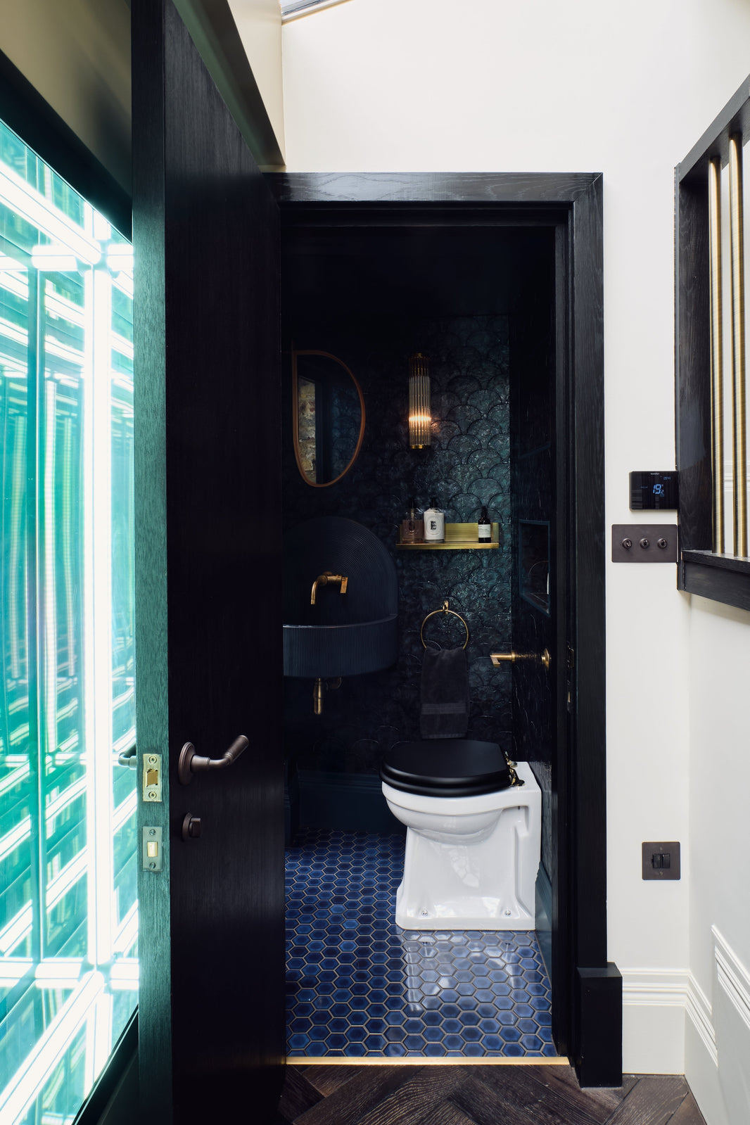 Studio Ore Unlacquered Brass Basin Taps in this luxury residence in London.