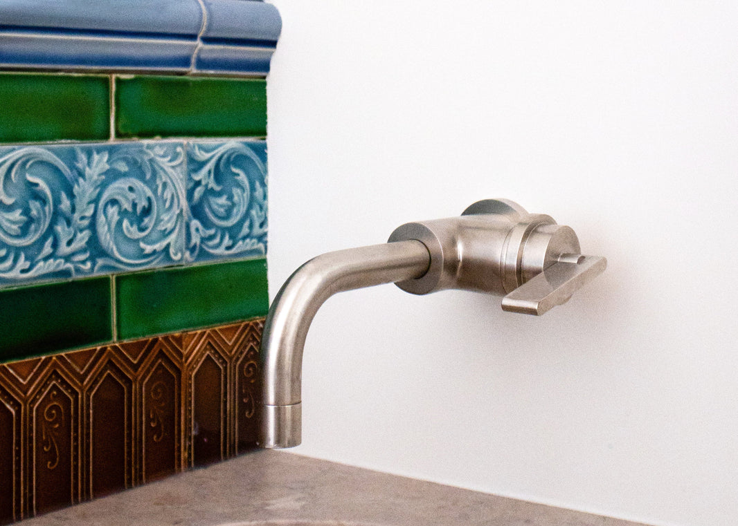 A Nickel Wall Mounted Mixer Tap by Studio Ore