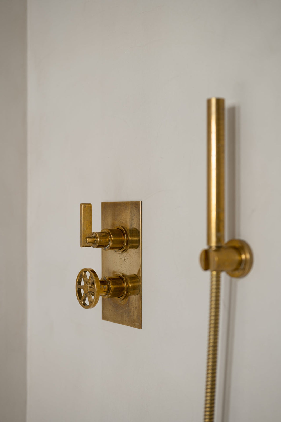 Why does brass darken over time?