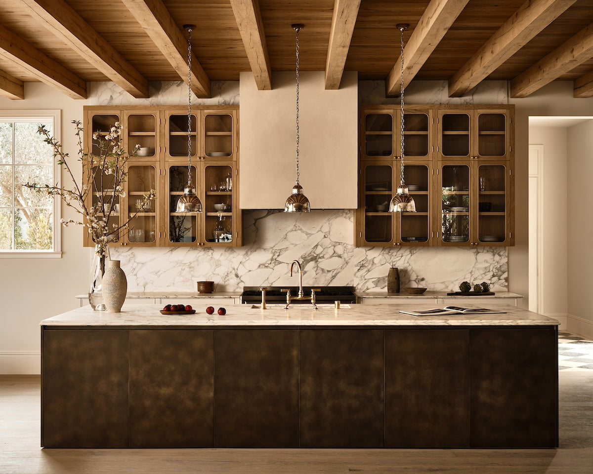 In this design by Oren Levy, our Kitchen Bridge Mixer tap stands at the centre of an expansive island. Next to it is our Kitchen Hand Rinse. 