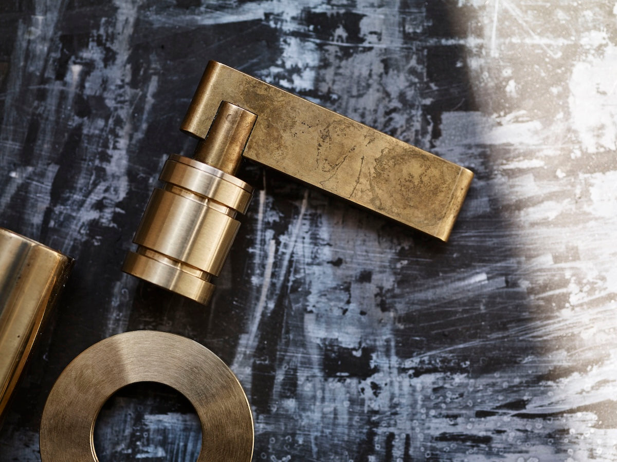 Close-up view of Studio Ore's signature lever handle. Solid brass. 