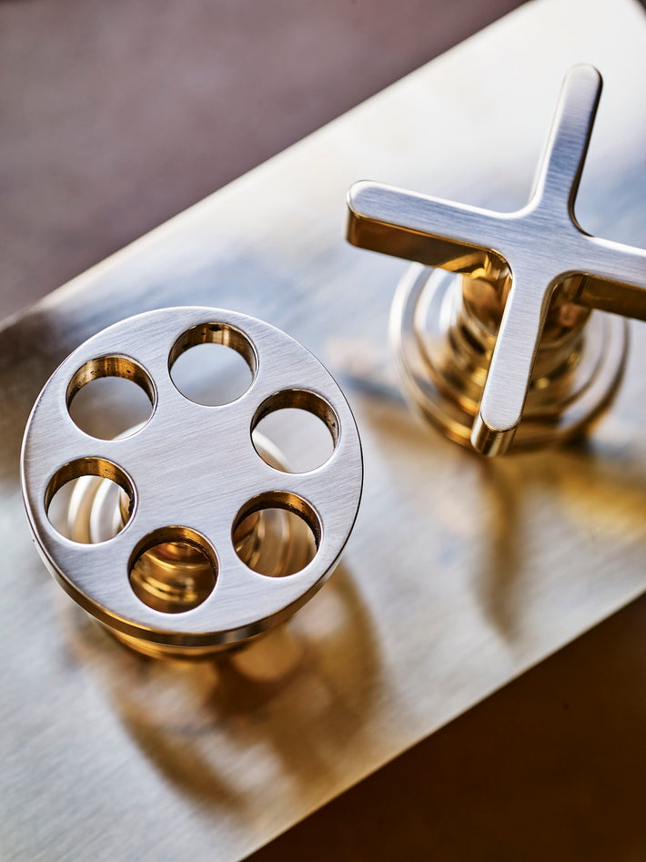Studio Ore's Dual Shower Thermostat with Two Way Diverter in unlacquered brushed brass. There's a fine directional grain. Precision is required to achieve this texture.