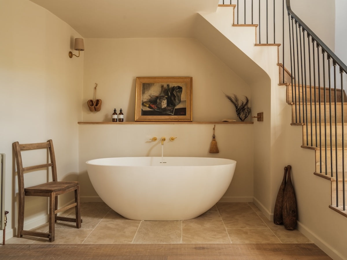 Ensuite bathroom at Osip, featuring Studio Ore's Three Hole Wall Mounted Bath Tap from Chapter One.