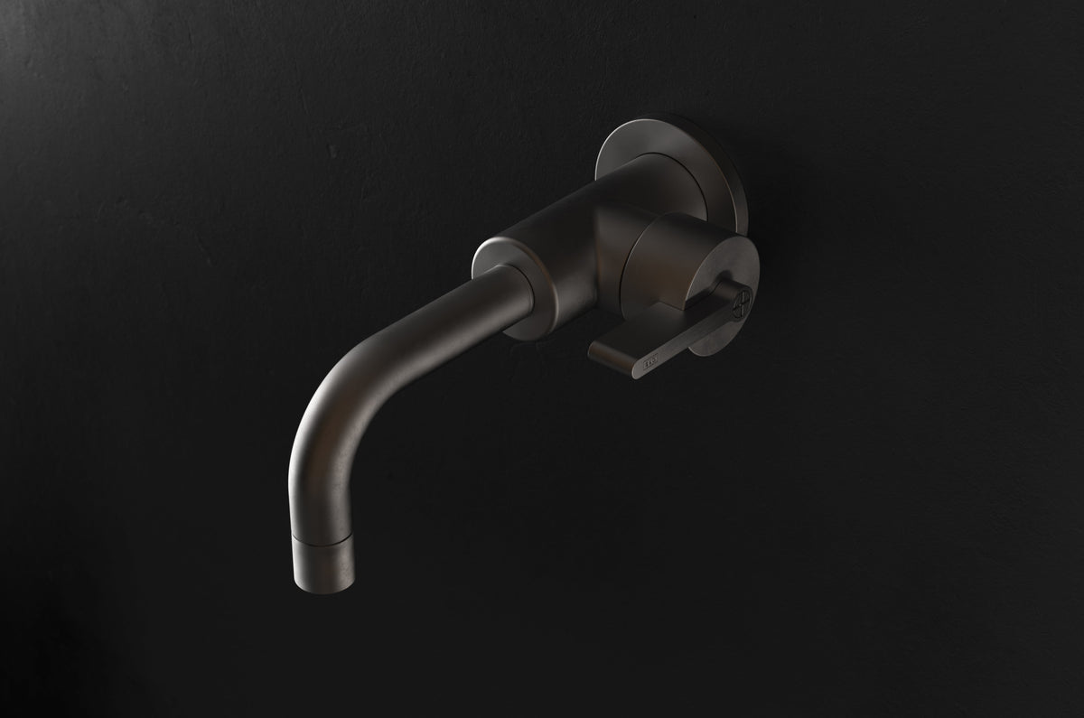 Studio Ore Chapter Three Wall Mounted Basin Mixer with Teardrop Lever handle in bronze
