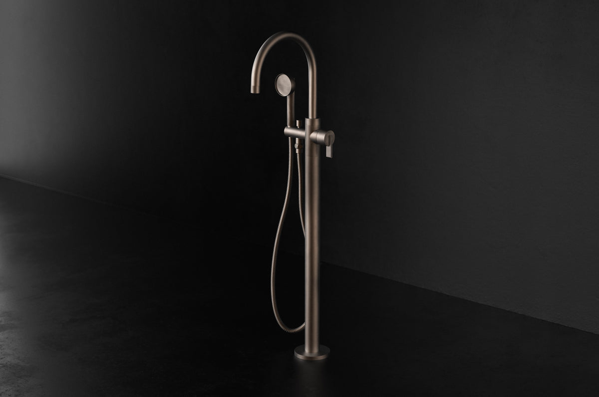 Studio Ore Chapter Three Floor Mounted Bath Mixer with Hand Shower with Lever handle in bronze