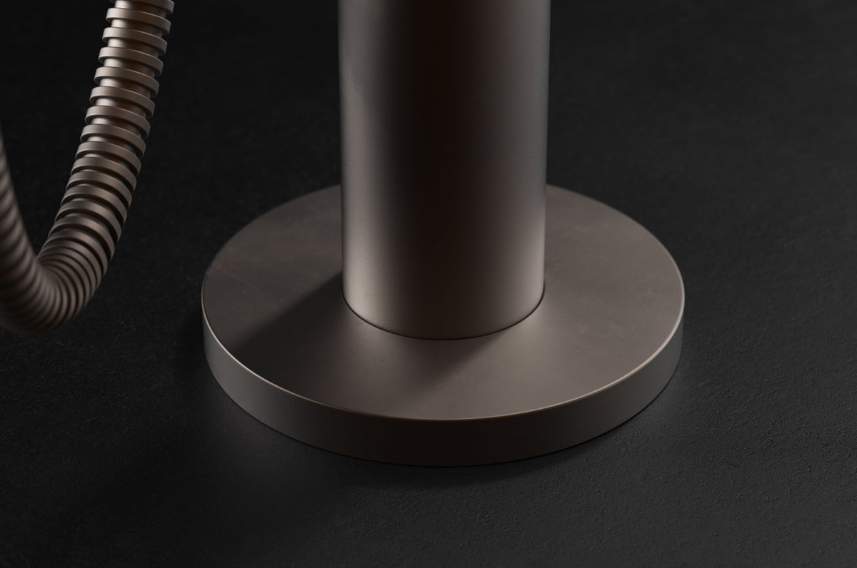 Studio Ore Chapter Three Floor Mounted Bath Mixer with Hand Shower with Lever handle in bronze, detail view
