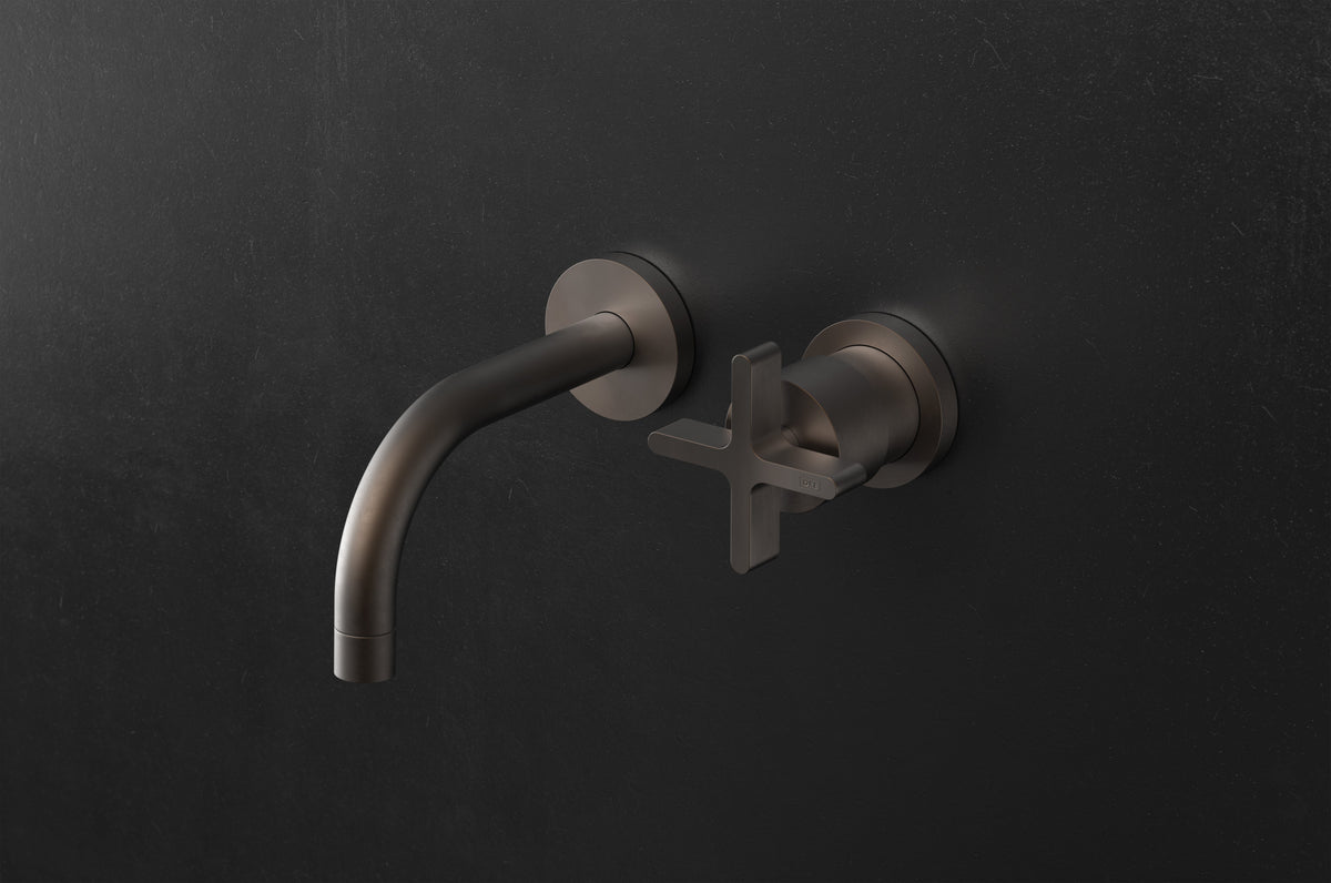 Studio Ore Chapter Three Two Hole Wall Mounted Basin Mixer with Curved Spout with Cross handle in bronze