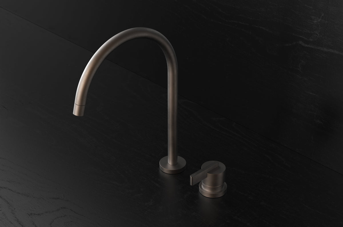 Studio Ore Chapter Three Two Hole Deck Mounted Swivel Kitchen Mixer with Lever handle in bronze