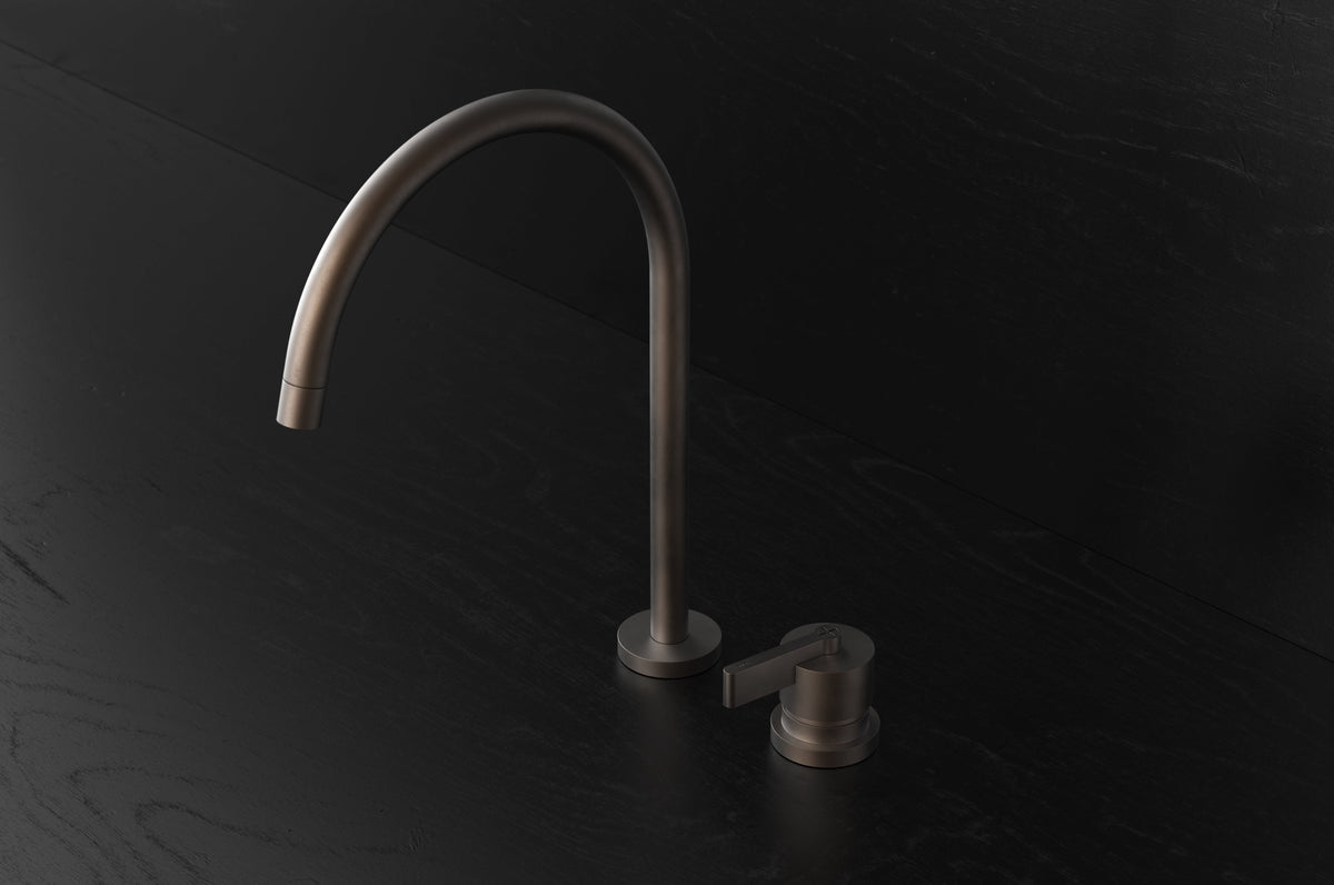 Studio Ore Chapter Three Two Hole Deck Mounted Swivel Kitchen Mixer with Teardrop Lever handle in bronze
