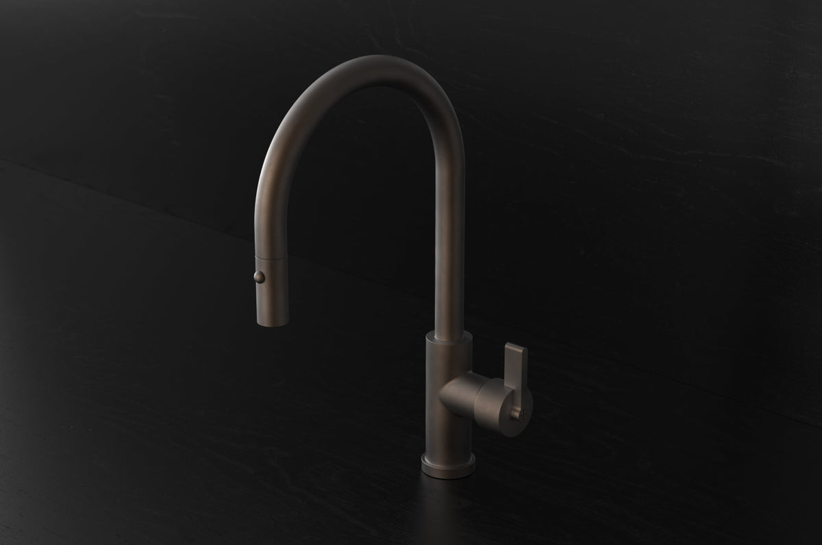 Studio Ore Chapter Three Deck Mounted Kitchen Mixer with Pull Out Hand Shower with Teardrop Lever handle in bronze