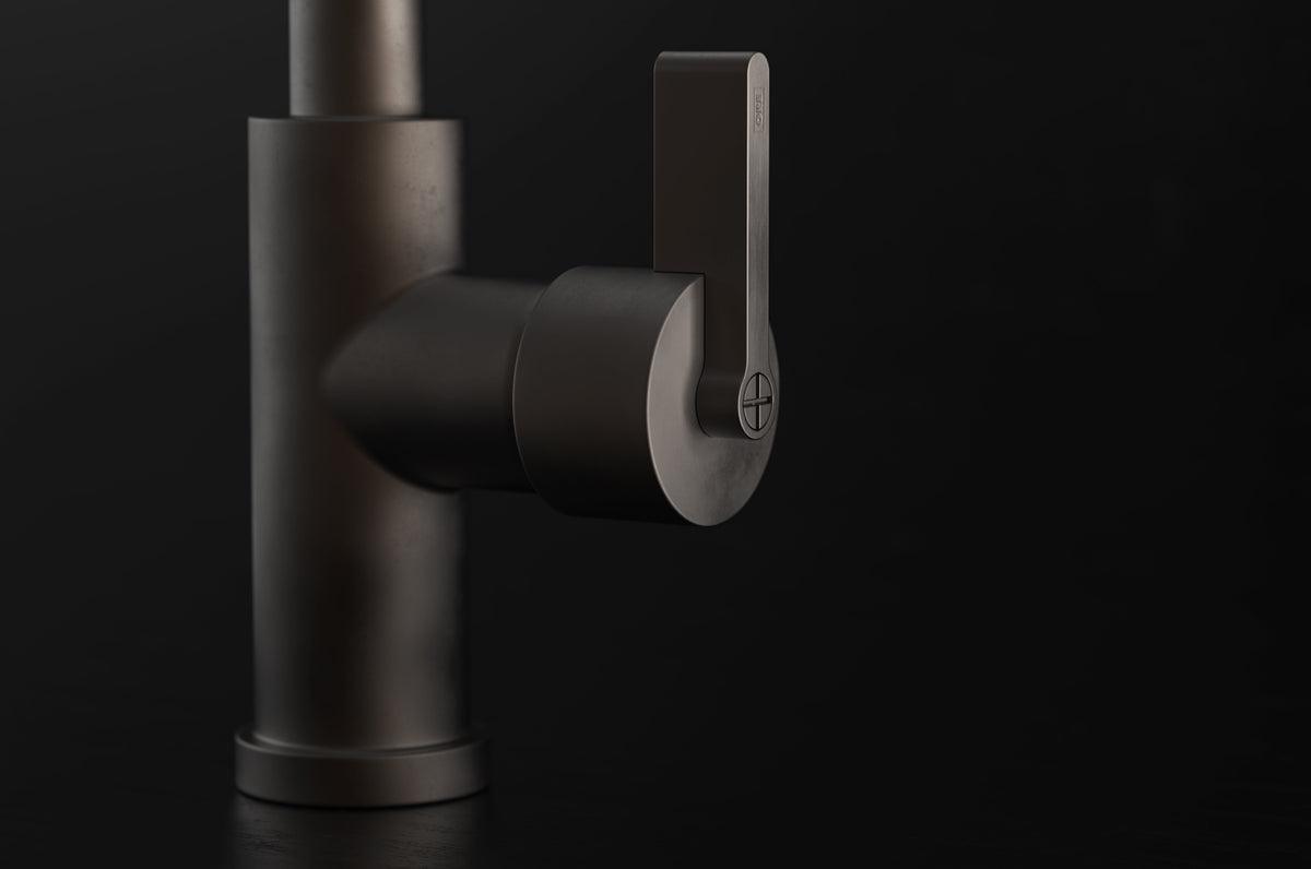 Studio Ore Chapter Three Deck Mounted Kitchen Mixer with Pull Out Hand Shower with Teardrop Lever handle in bronze, detail view