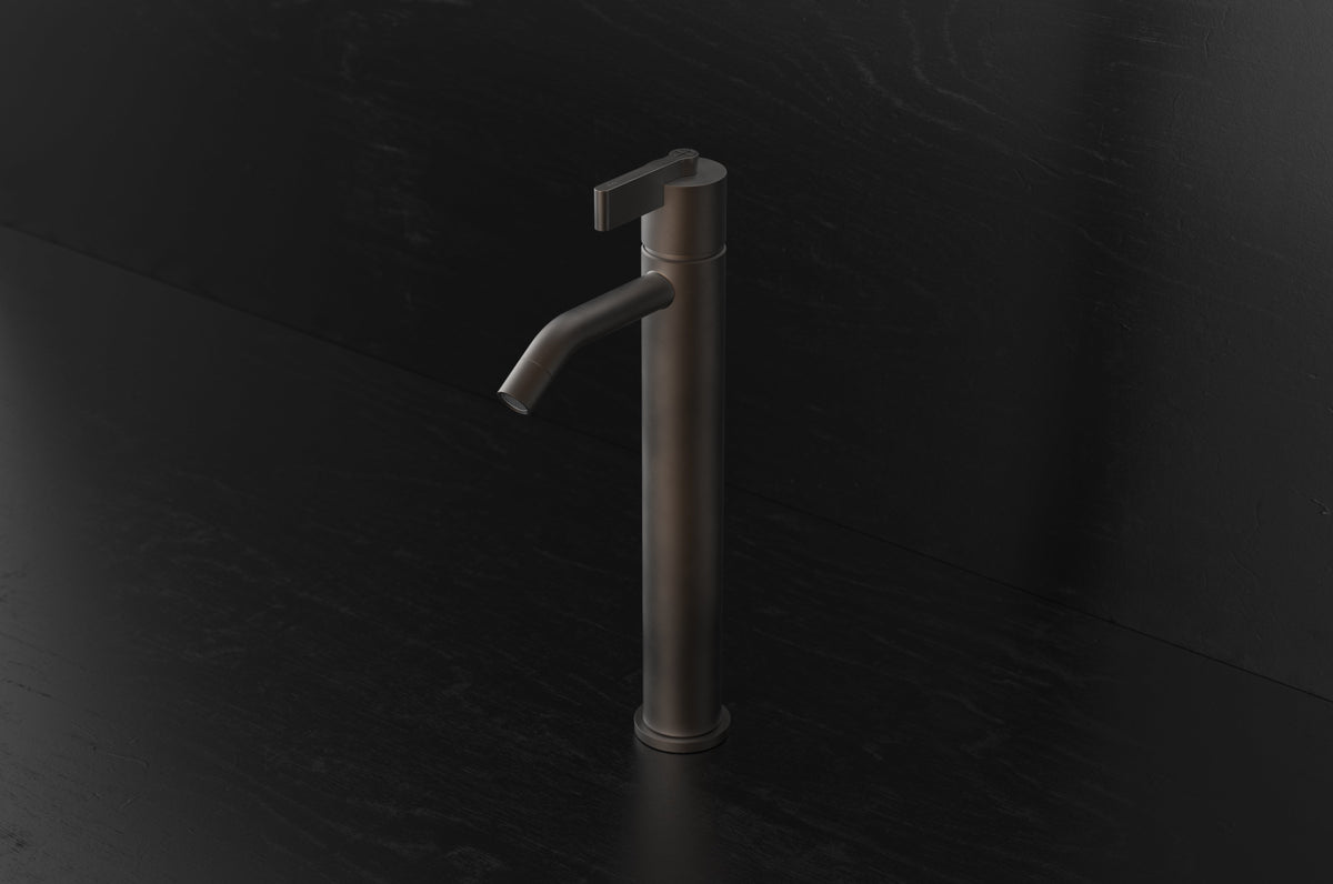 Studio Ore Chapter Three Deck Mounted Tall Basin Pillar Tap with Teardrop Lever handle in bronze
