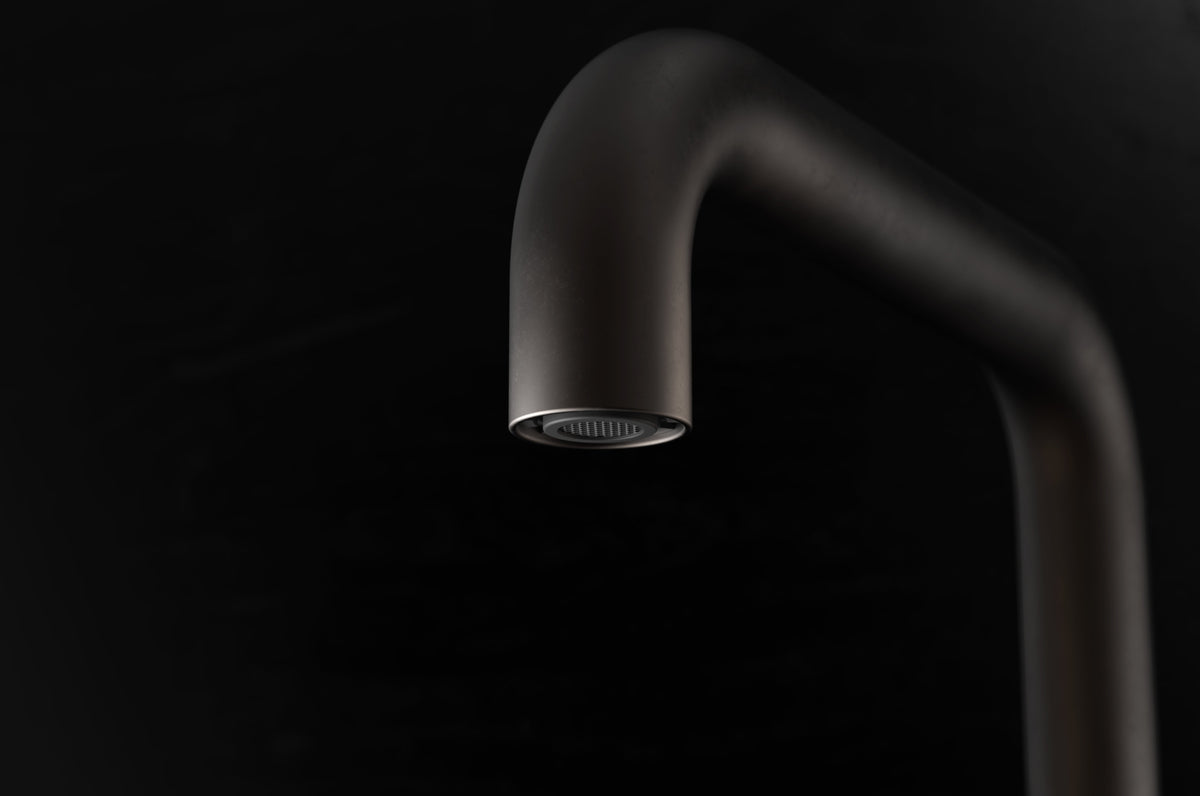 Studio Ore Chapter Three Deck Mounted Basin Two Hole Mixer with Teardrop Lever handle in bronze, detail view