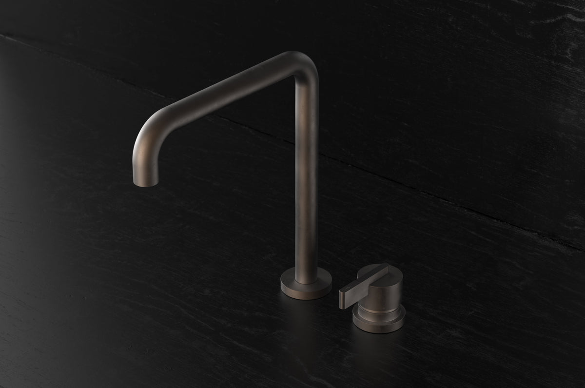 Studio Ore Chapter Three Two Hole Deck Mounted Swivel Kitchen Mixer with Double Curve Spout with Lever handle in bronze