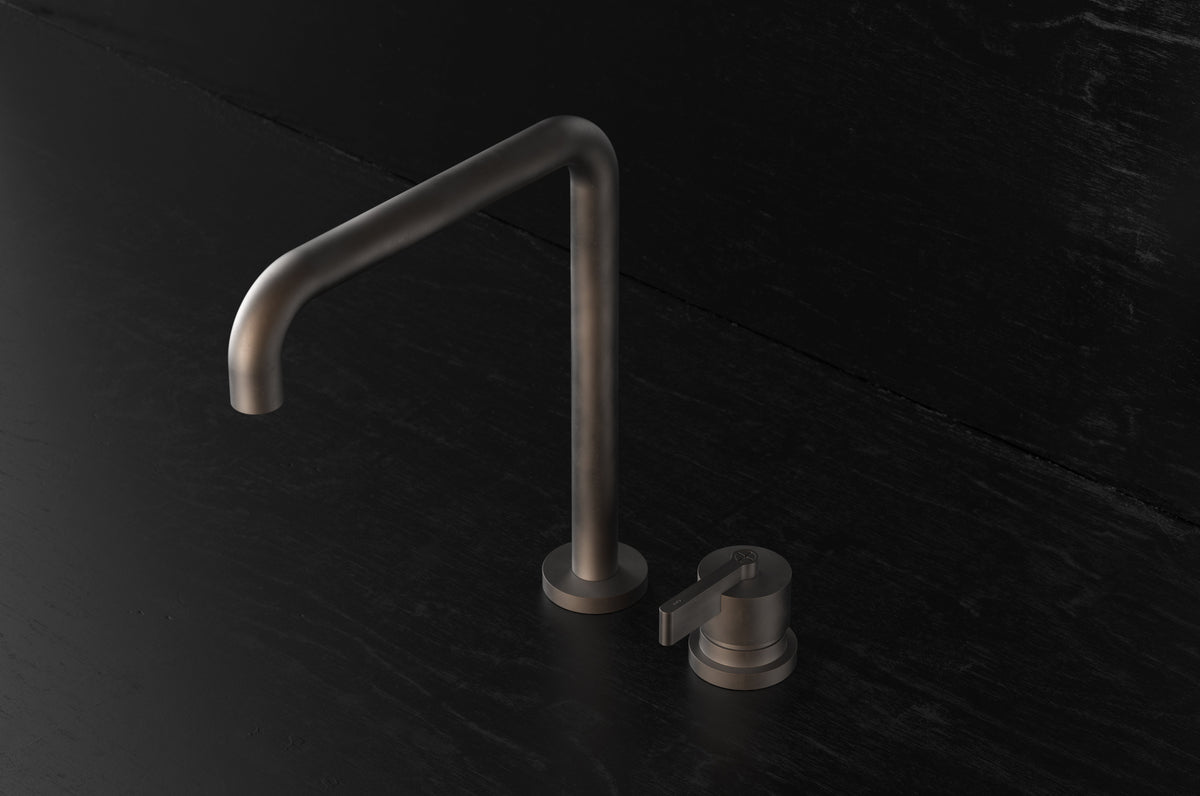 Studio Ore Chapter Three Two Hole Deck Mounted Swivel Kitchen Mixer with Double Curve Spout with Teardrop Lever handle in bronze