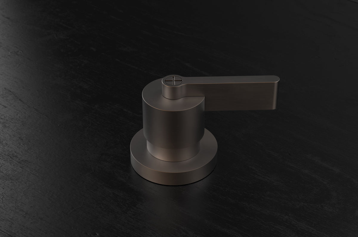 Studio Ore Chapter Three Deck Mounted Diverter with Teardrop Lever handle in bronze