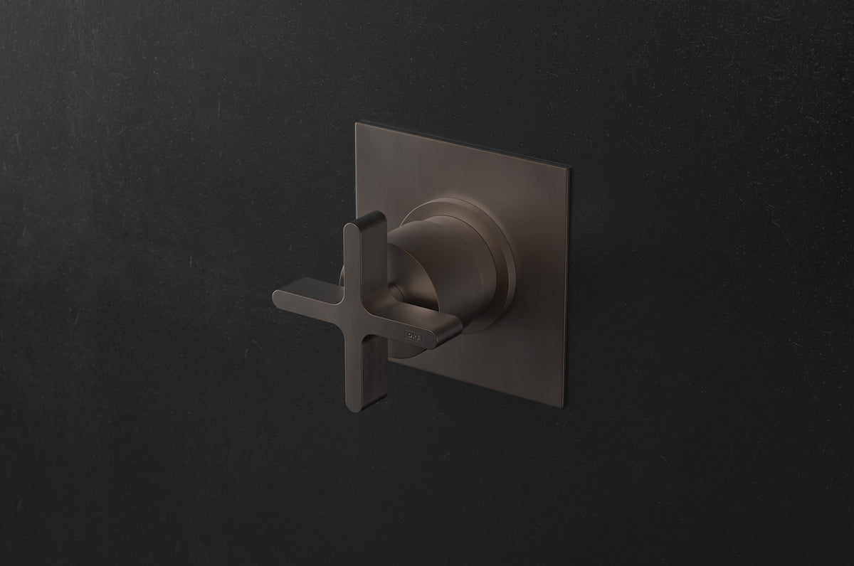 Studio Ore Chapter Three Wall Mounted Shower Mixer with Cross Handle in bronze, square backplate