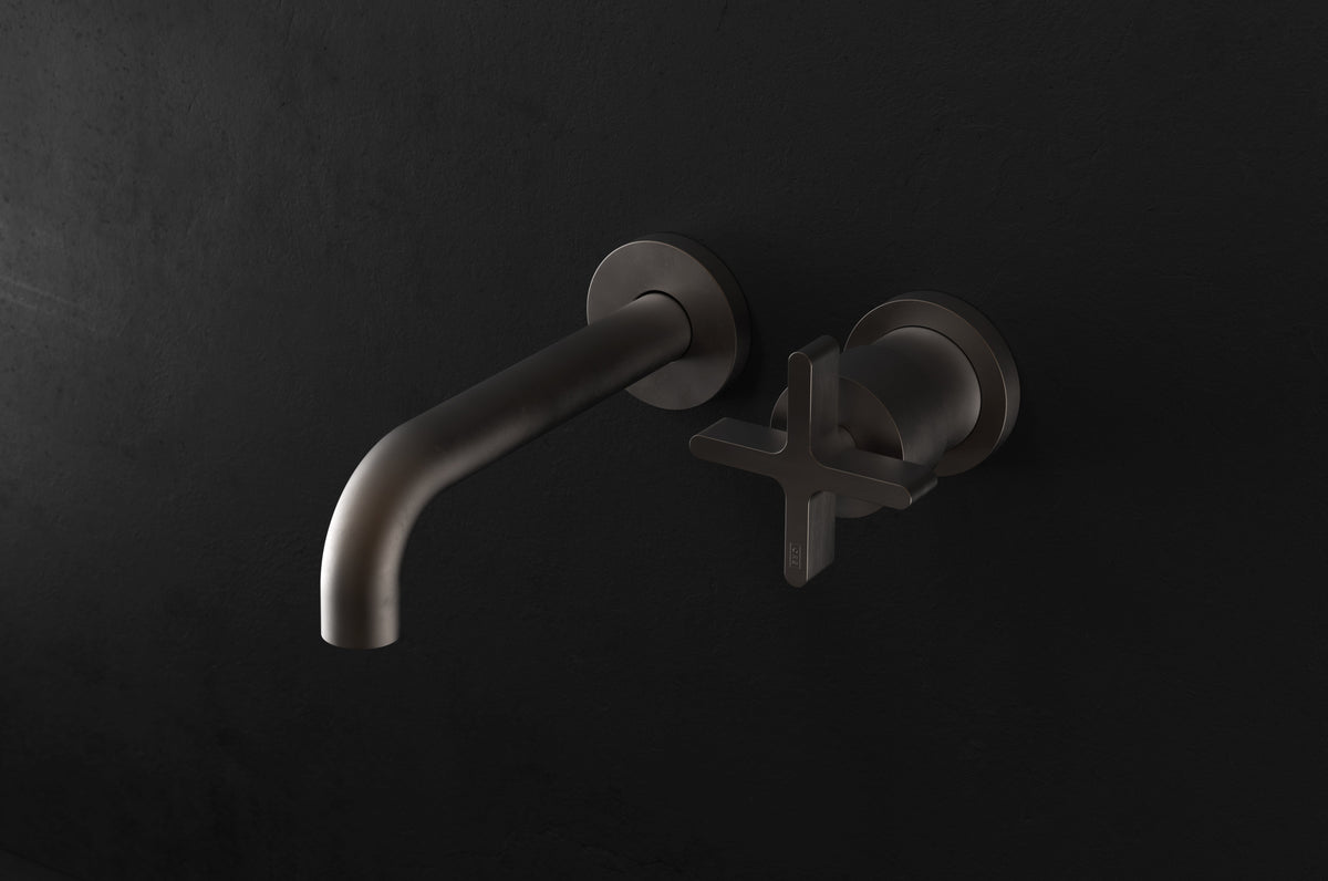 Studio Ore Chapter Three Two Hole Wall Mounted Basin Mixer with Angled Spout with Cross handle in bronze, long spout
