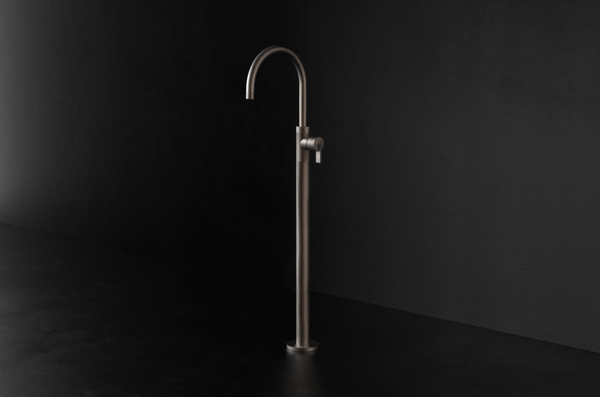 Studio Ore Chapter Three Floor Mounted Bath Mixer with Teardrop Lever handle in bronze