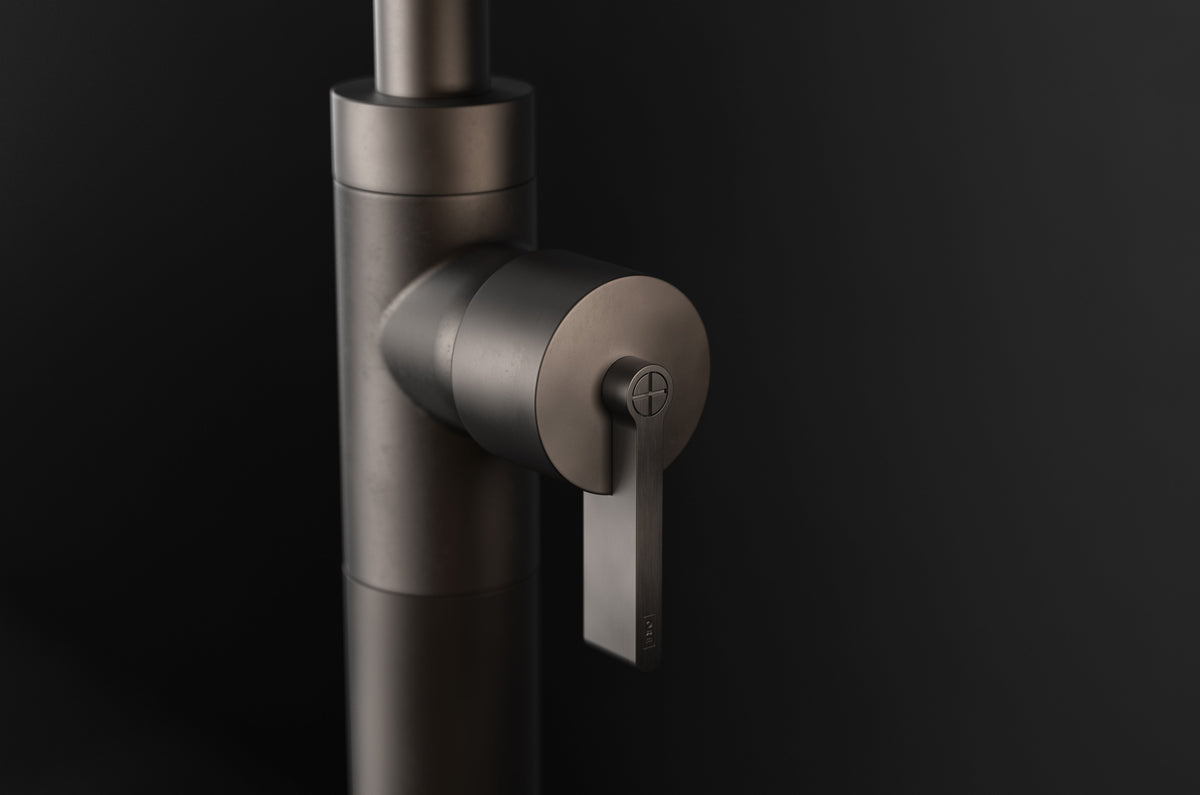 Studio Ore Chapter Three Floor Mounted Bath Mixer with Teardrop Lever handle in bronze, detail view