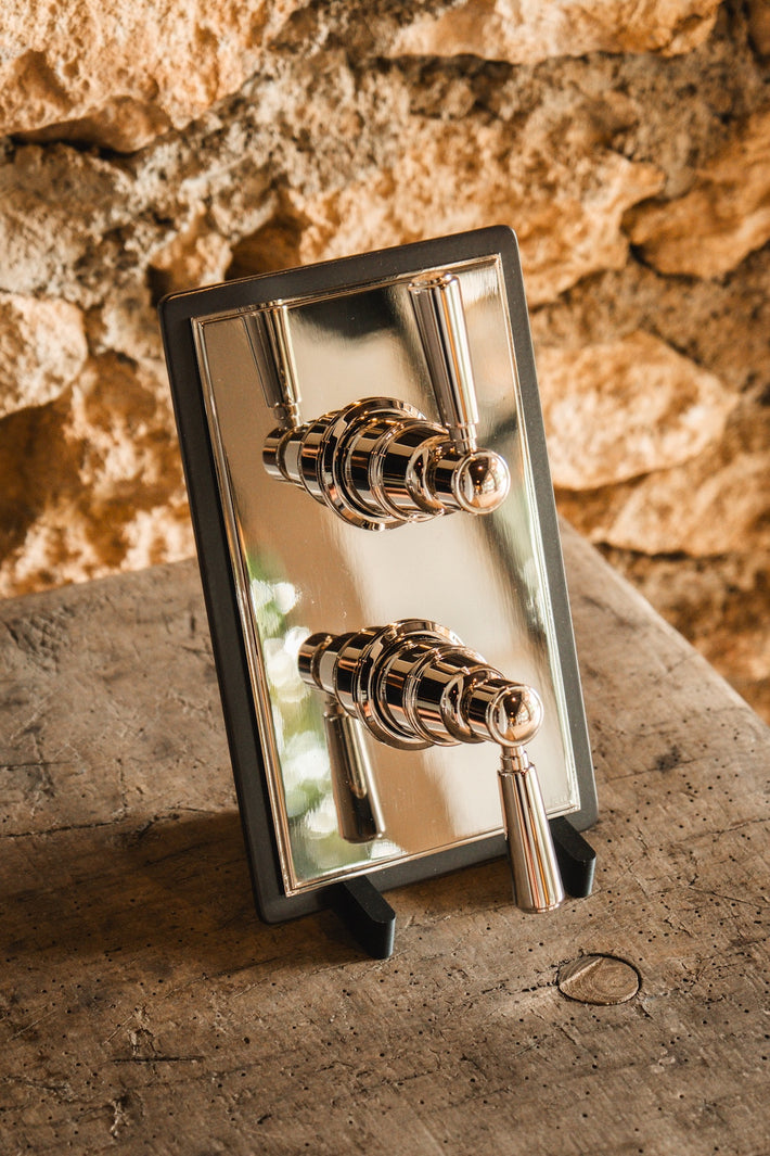 Studio Ore's new traditional dual shower thermostat with two-way diverter in polished nickel, from Chapter Four.
