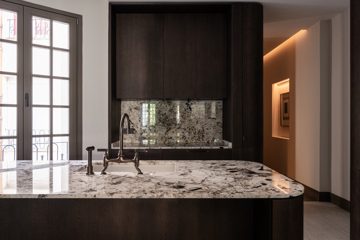 Studio Ore fittings in lacquered bronze are found in this modern apartment in Madrid.